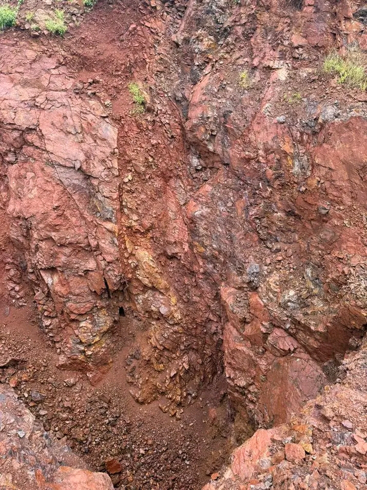 Exposed reddish rock formation documented during Lonely Mine Claims assessment